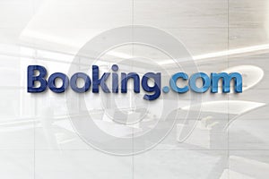 Bookingcom on glossy office wall realistic texture
