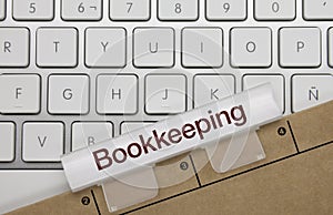 Bookkeeping - Inscription on Blue Keyboard Key