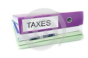 Bookkeeping office files in the folder with pen and blank sign. Taxes. photo