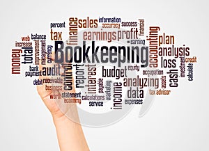 Bookkeeping word cloud and hand with marker concept