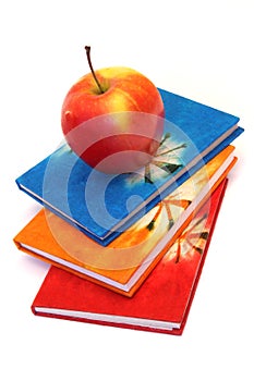 Books and apple