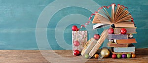 books as christmas gift,christmas present,reading,literature,education,making a gift,holiday concept