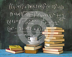 Books and blackboard