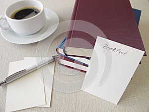 Books, booklist and cup of coffee
