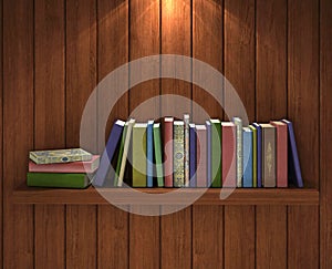 Books on the brown wooden bookshelf