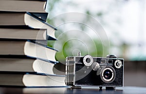 Books and Cameras Put on the floor. White leather Book and study