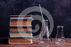 Books and chemical flasks