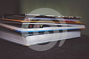 Books are close-up. A stack of books with the inscription on the cubes. Hobbies reading books