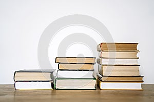 Books on desk in a school or university classroom. Education, study concept background