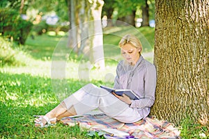 Books every girl should read. Relax leisure an hobby concept. Best self help books for women. Girl concentrated sit park