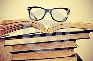 Books and eyeglasses photo