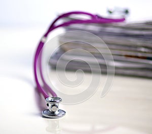 Books folder file and stethoscope isolated on