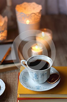 Books, Glasses, E-Reader, Pen, Tea, Cookies and Candles