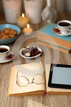 Books, Glasses, Tablet, Tea, Chocolate, Cookies and Candles