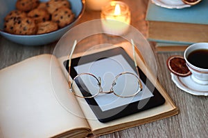 Books, Glasses, Tablet, Tea, Chocolate, Cookies and Candles