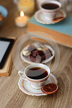 Books, Glasses, Tablet, Tea, Chocolate, Cookies and Candles