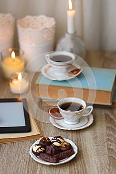 Books, Glasses, Tablet, Tea, Chocolate, Cookies and Candles