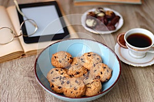 Books, Glasses, Tablet, Tea, Chocolate, Cookies and Candles