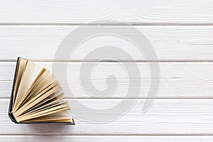 Books on library desk for reading and education on white wooden background top view mockup