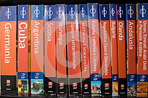 Books from the Lonely Planet series on the bookcase