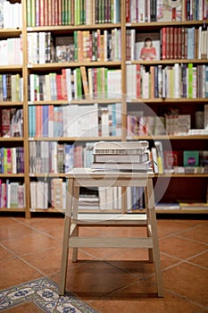 books lying ladder bookstore. High quality photo