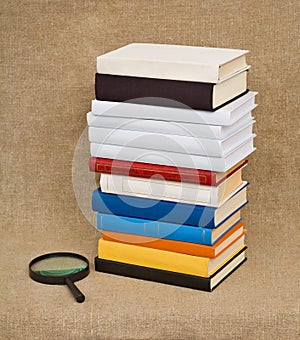 Books and magnifier - Educational still life