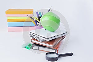 Books, notebooks and school supplies on white background .concept of education