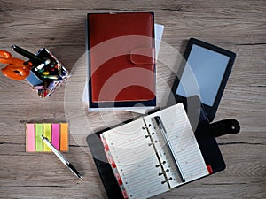 Books, organizer, notepad and ebook reader.