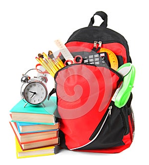 Books, school accessories and a backpack.