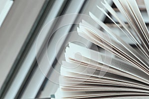 Books stacked glasses on the table