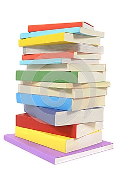 Books, untidy pile or stack, isolated on white background, vertical