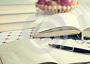 Books and volumes on the table