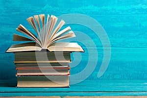 Books on wooden desk table and abstract background. Education background. Copy Space. Back to school.