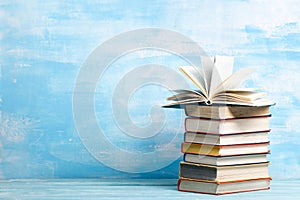 Books on wooden desk table and abstract background. Education background. Copy Space. Back to school.