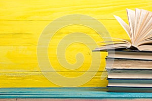 Books on wooden desk table and abstract background. Education background. Copy Space. Back to school.