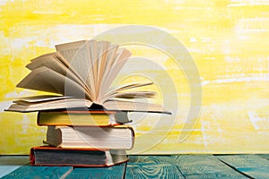 Books on wooden desk table and abstract background. Education background. Copy Space. Back to school.