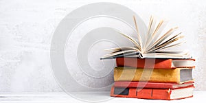 Books on wooden desk table and abstract background. Education background. Copy Space. Back to school.