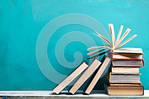 Books on wooden desk table and abstract background. Education background. Copy Space. Back to school.