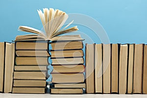 Books on wooden desk table and abstract background. Education background. Copy Space. Back to school.