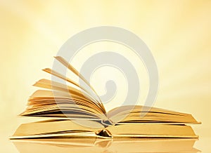 Books on yellow background