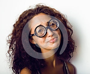 Bookworm, cute young woman in glasses, curly hair