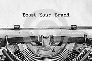 Boost Your Brand text is typed not by a vintage