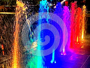 Boosted Color Water Fountain Jets at Night photo