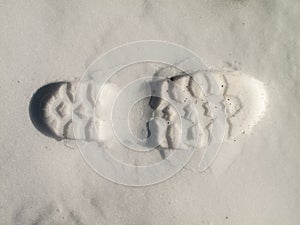 Boot footstep on snow