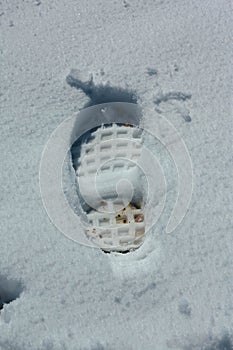Boot print in the snow photo