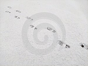 Bootprints on the snow. Mobile Photo photo