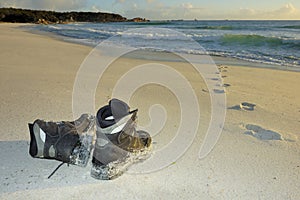 Boots left on the beach