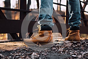Boots Overlooking Bridge