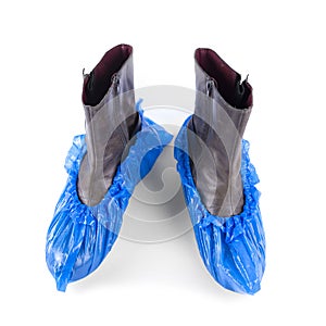 Boots in shoe covers moisture protection