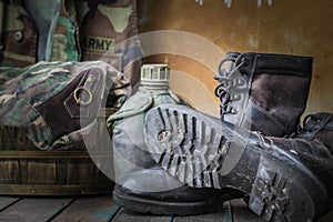 Boots of soldiers on wooden